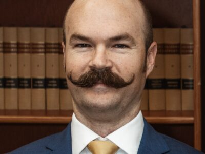 Gregory J. Larson, Esq.